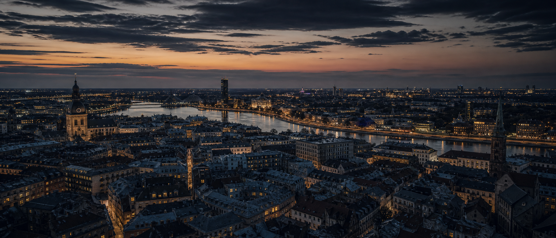 An aerial view of a city at dusk — your territory