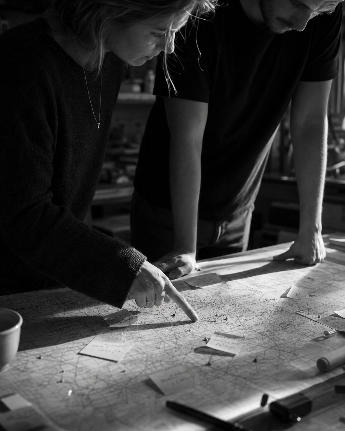 Operators planning at a workshop table